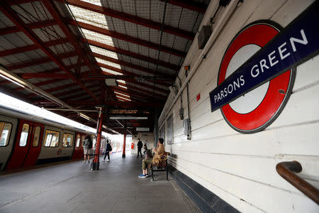 Passengers wait to for a train at Parson's Green Underground station after it reopened following an explosion on a rush hour train yesterday morning, in London, Britain, September 16, 2017. REUTERS/Peter Nicholls