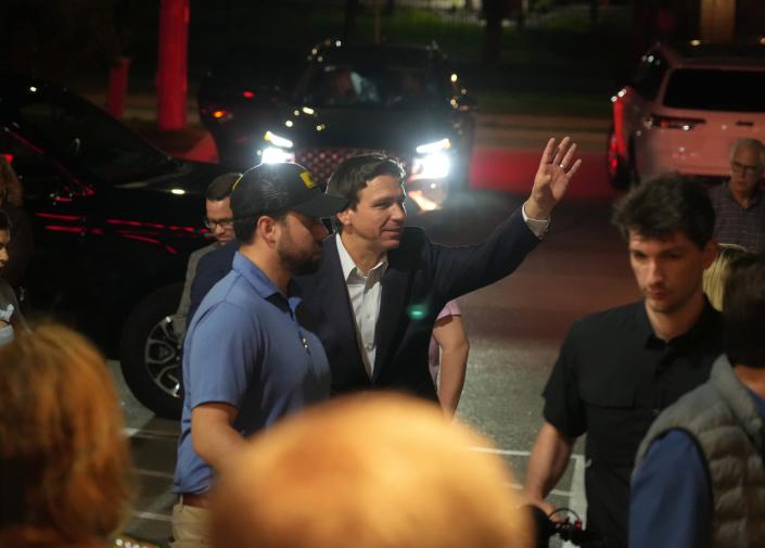 Florida Gov. Ron DeSantis visits with supporters after making an unscheduled visit to Jethro&#x002019;s BBQ Southside in Des Moines on Saturday, May 13, 2023.