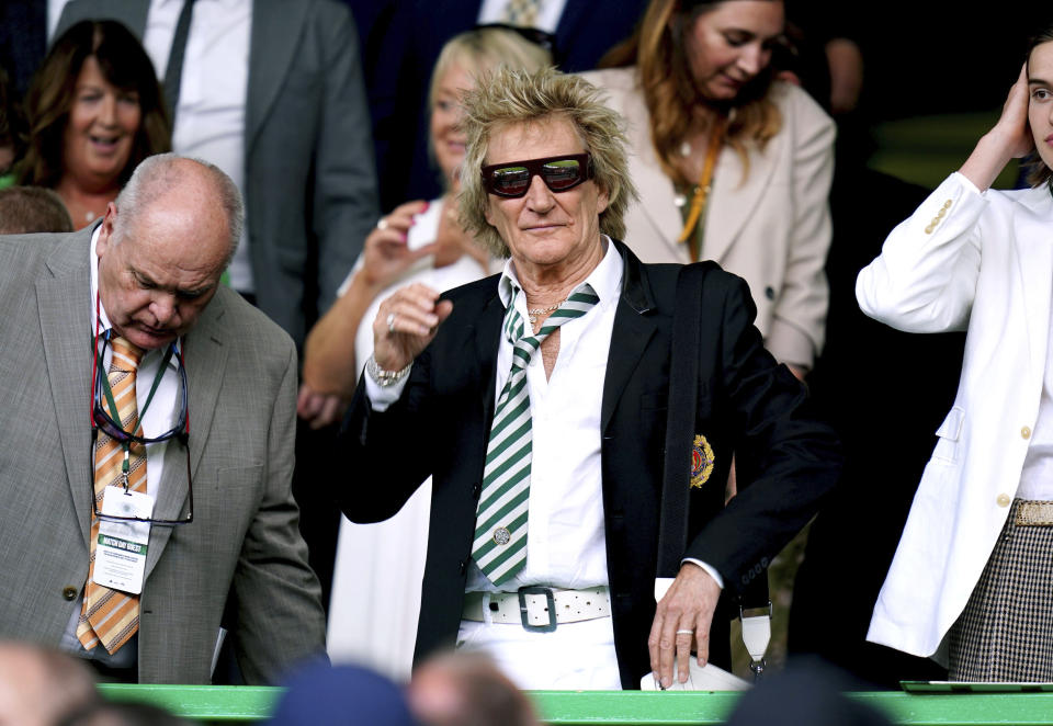 Singer Rod Stewart gestures, ahead of the Scottish Premiership soccer match between Glasgow Rangers and Celtic Glasgow, at the Celtic park, Glasgow, Scotland, Saturday, May 11, 2024. (Jane Barlow/PA via AP)