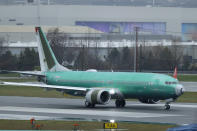 A Boeing 737 Max airplane being built for Norwegian Air International taxis for a test flight, Wednesday, Dec. 11, 2019, at Renton Municipal Airport in Renton, Wash. The chairman of the House Transportation Committee said Wednesday that an FAA analysis of the 737 Max performed after a fatal crash in 2018 predicted "as many as 15 future fatal crashes within the life of the fleet" during opening remarks at the committee's fifth hearing on the Boeing 737 Max. (AP Photo/Ted S. Warren)