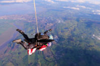 A thrill seeking great-gran has celebrated her 90th birthday - by taking to the air and SKYDIVING from 15,000 feet. Sprightly Patricia Baker said it felt "awesome" to plunge from a whopping three miles up in testing conditions. Brilliant photos and videos show the widowed gran-of-ten dressed in a red jumpsuit flying through the sky. Patricia said she "wasn't too worried" about the jump because she "keeps herself fit" by doing 50 sit ups every morning. And her main motivation was to raise some money for charity, she added.