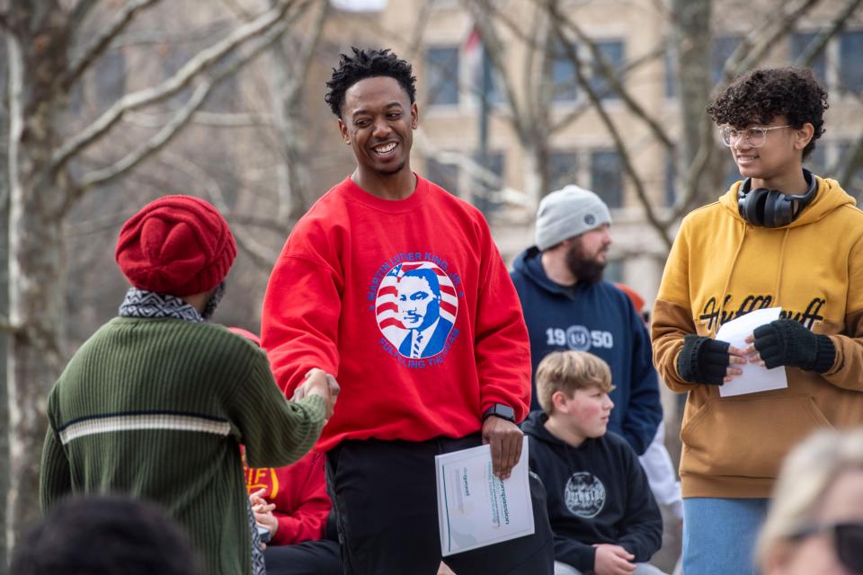 Fletcher Mayor Preston Blakely is greeted at the Martin Luther King Jr. Rally at Pack Square Park in Asheville January 16, 2023.