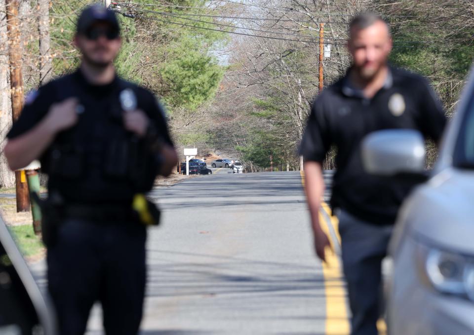 Agents swarm a home in Dighton on April 13, 2023, where they detained Massachusetts Air National Guardsman Jack Teixeira, suspected then of leaking classified documents.