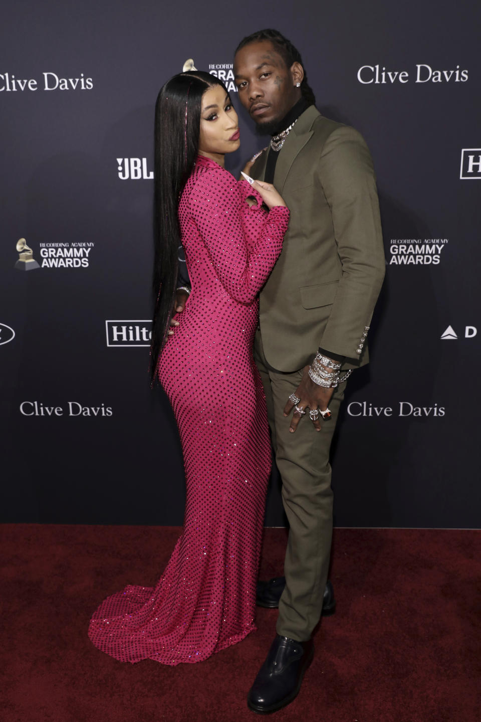 Cardi B, left, and Offset arrive at the Pre-Grammy Gala And Salute To Industry Icons at the Beverly Hilton Hotel on Saturday, Jan. 25, 2020, in Beverly Hills, Calif. (Photo by Mark Von Holden/Invision/AP)