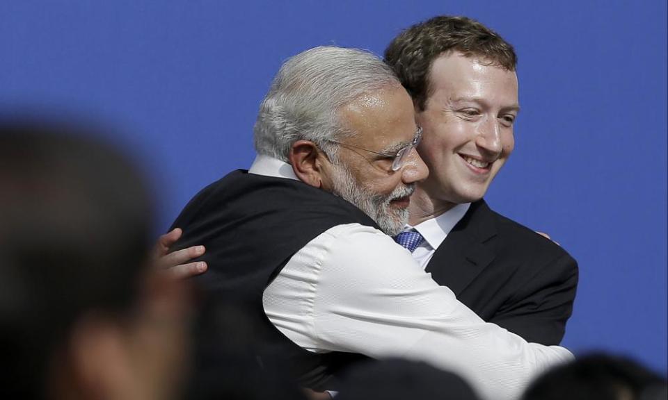 Mark Zuckerberg, right, hugs Narenda Modi at Facebook in 2015.