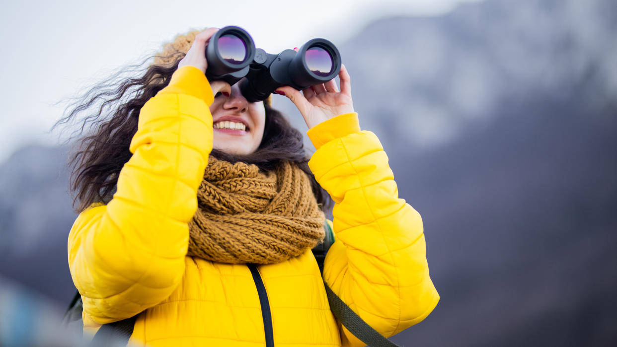  Reasons you need binoculars: woman with bins. 