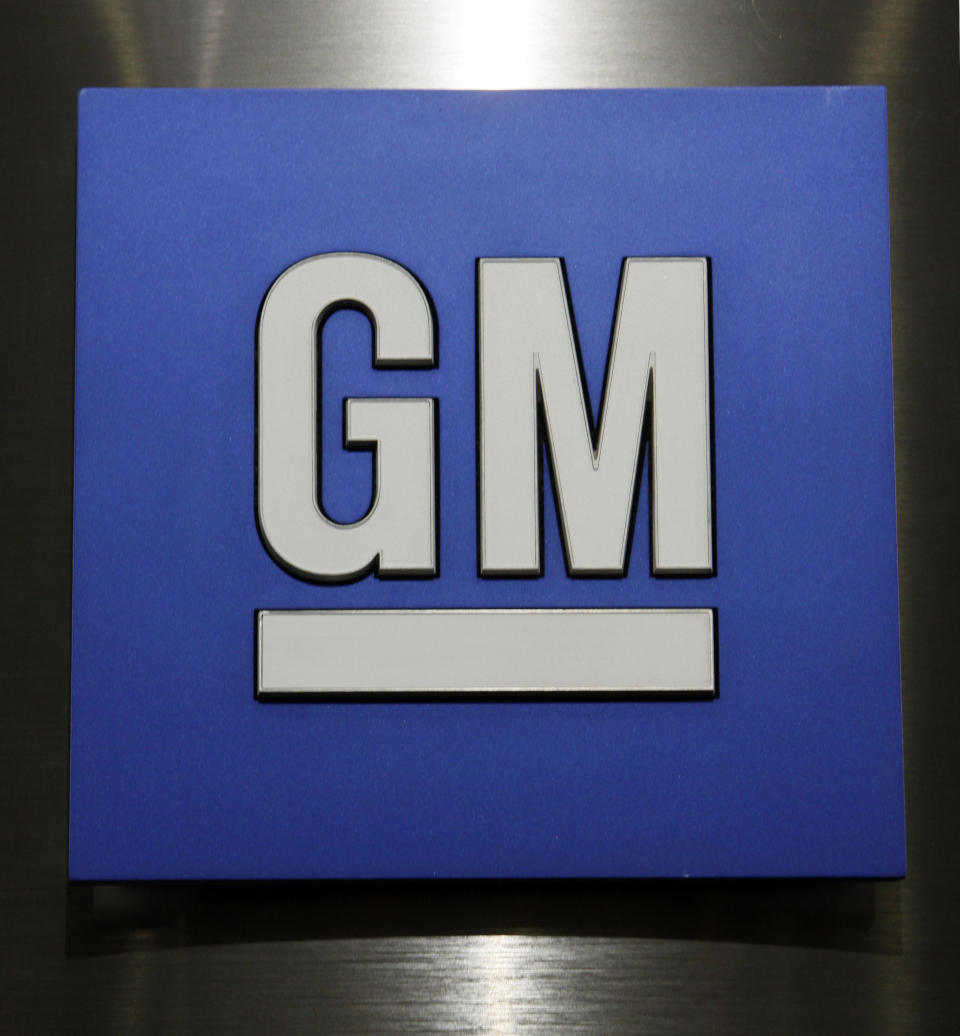 FILE - In this Jan. 25, 2010, file photo, a General Motors Co. logo is shown during a news conference in Detroit. General Motors is boosting by 971,000 the number of small cars being recalled worldwide for a defective ignition switch, saying cars from the model years 2008-2011 may have gotten the part as a replacement. (AP Photo/Paul Sancya, File)