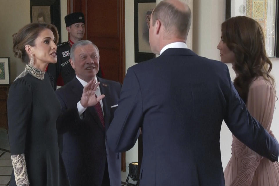 King Abdullah II and Queen Rania greet Britain's Prince William and his wife, Kate, before the marriage ceremony of Crown Prince Hussein and Saudi architect Rajwa Alseif, Thursday, June 1, 2023 in Amman, Jordan. (Royal Hashemite Court via AP)