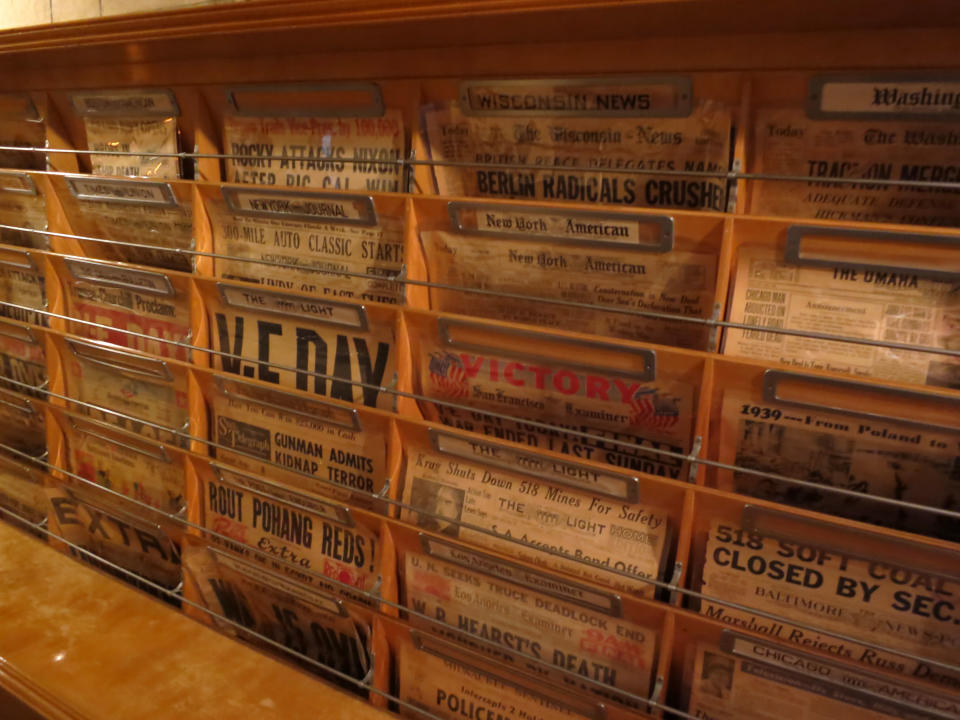 This Aug. 30, 2013 photo shows old newspapers outside of the office at The Hearst Castle, the 165-room estate of newspaper publisher William Randolph Hearst, in San Simeon, Calif. (AP Photo/Jim MacMillan)