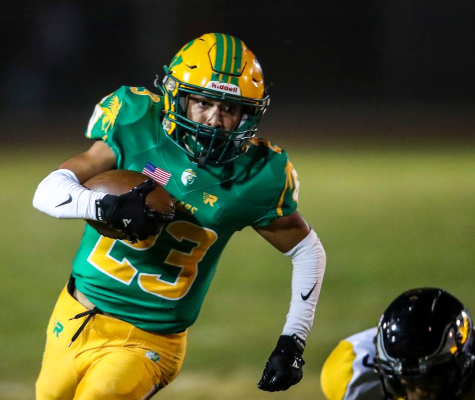 Coachella Valley's Aaron Ramirez (23) carries the ball during the first quarter of their game at Coachella Valley High School in Thermal, Calif., Friday, Sept. 22, 2023.