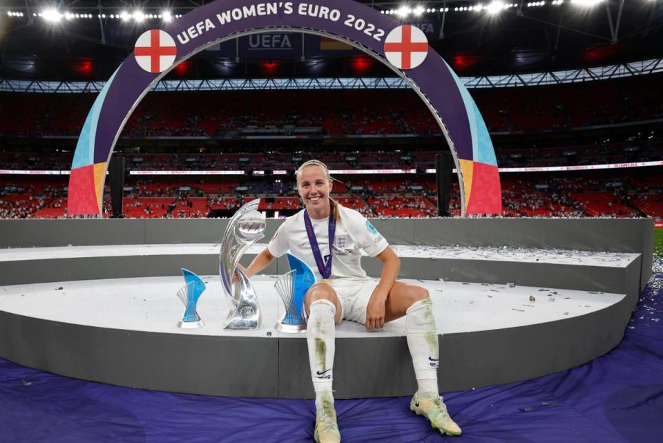 Beth Mead poses with the Euro 2022, top scorer and player of the tournament trophies at Wembley last summer (The FA via Getty Images)