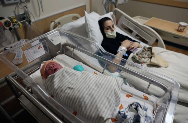 PHOTO: Susan Mohammadi and her newborn son Yusuf Mohammadi rest at Mercy San Juan Medical Center, Carmichael, Calif., May 12, 2022. (Brittany Hosea-Small/Reuters)