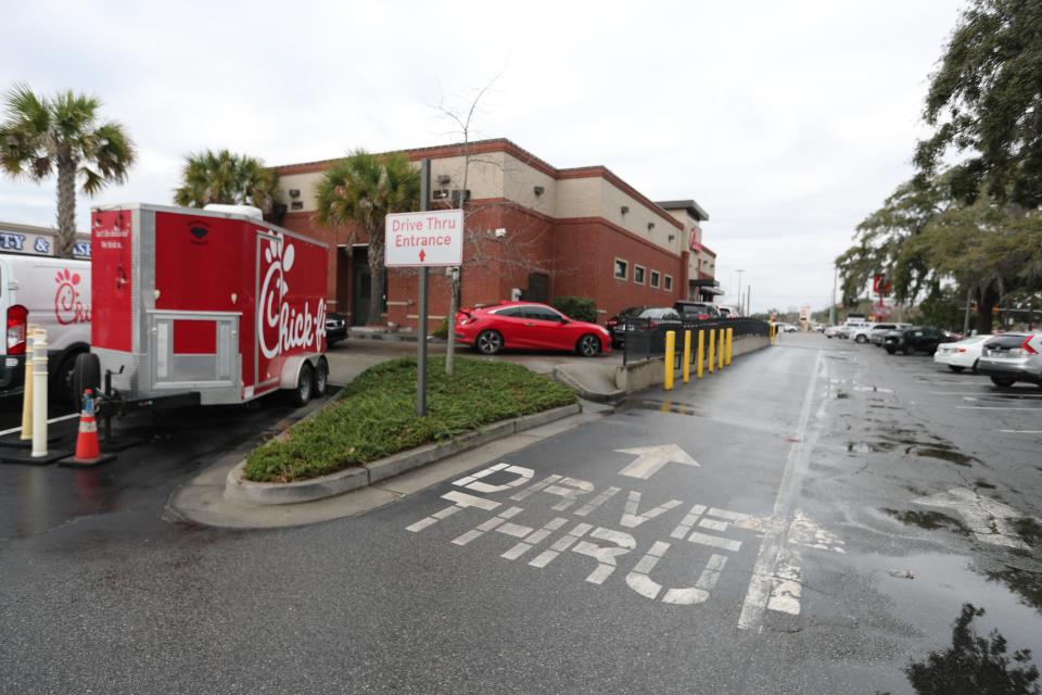 Signs direct customers to the Drive Thru lanes at Chick-fil-A on Victory Drive in Savannah.
