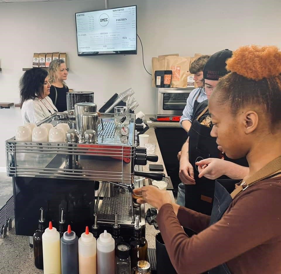 Baristas at the newly opened Go Make Coffee Co. in Welcome at the former MoJoe Coffee House wait on customers during the shop's soft opening on Saturday.