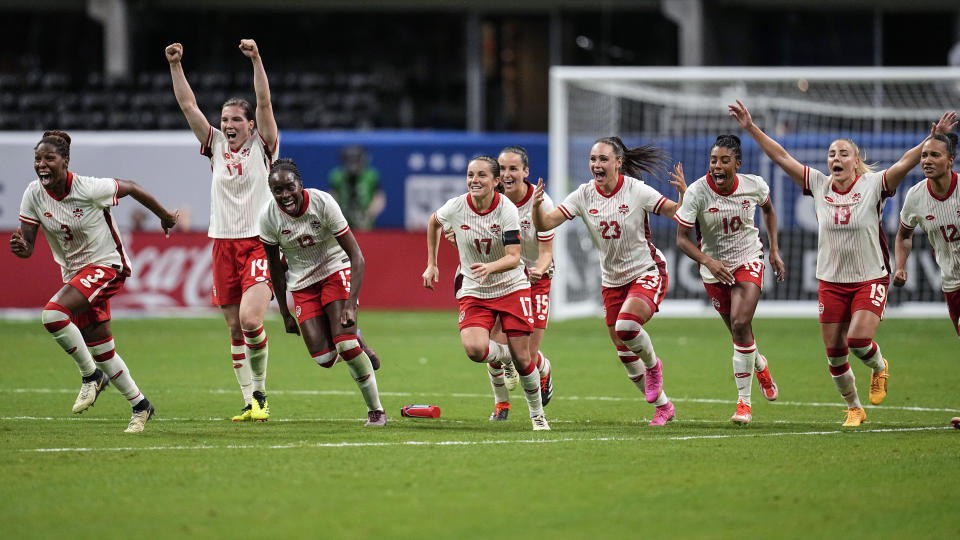 Canada players celebrate winning in a shootout against Brazil in a SheBelieves Cup women's soccer game, Saturday, April 6, 2024, in Atlanta. (AP Photo/Mike Stewart)