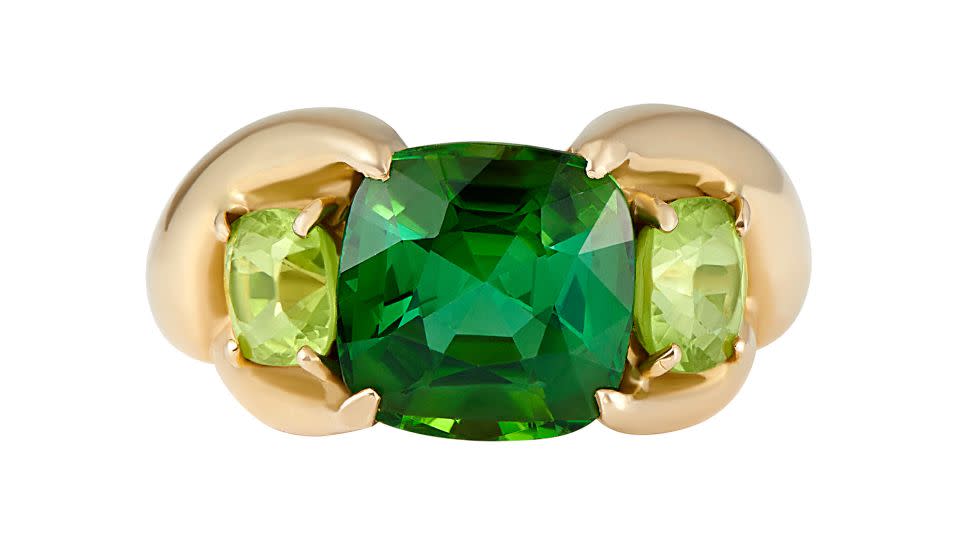 Ouroboros' "Lobsters for Life" ring in 18-carat gold set with a bi-chrome cushion cut Afghan tourmaline and cushion cut Burmese peridots (price on application). - Ouroboros