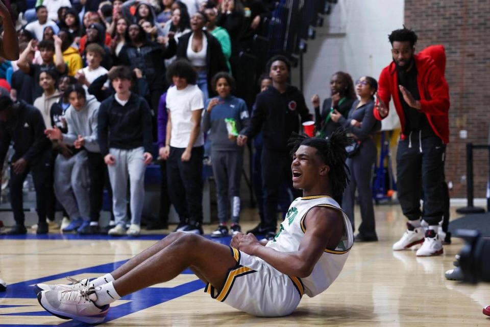 Bryan Station’s Amari Owens (5) celebrates drawing a foul against Sayre during the 42nd District Tournament semifinals at Henry Clay High School on Tuesday. Owens scored 20 points to lead the Defenders.