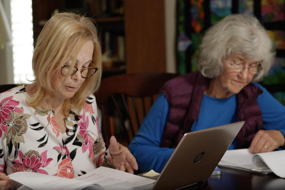 Donna Whitmore and Susan Gehlke of Hayward Concerned Citizens sift through the research they curated about Russell City. ( Abraham Villela)