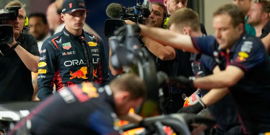 red bull racings dutch driver max verstappen l stands in their garages after being knocked out during the qualifying session of the saudi arabia formula one grand prix at the jeddah corniche circuit in jeddah on march 18, 2023 photo by luca bruno pool afp photo by luca brunopoolafp via getty images