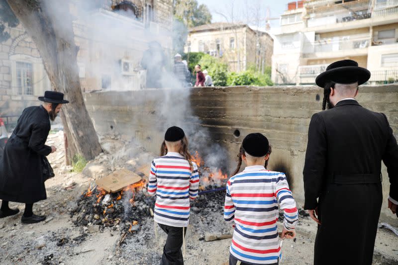 Ultra-Orthodox Jews burn leaven in the Mea Shearim neighbourhood of Jerusalem ahead of the Jewish holiday of Passover