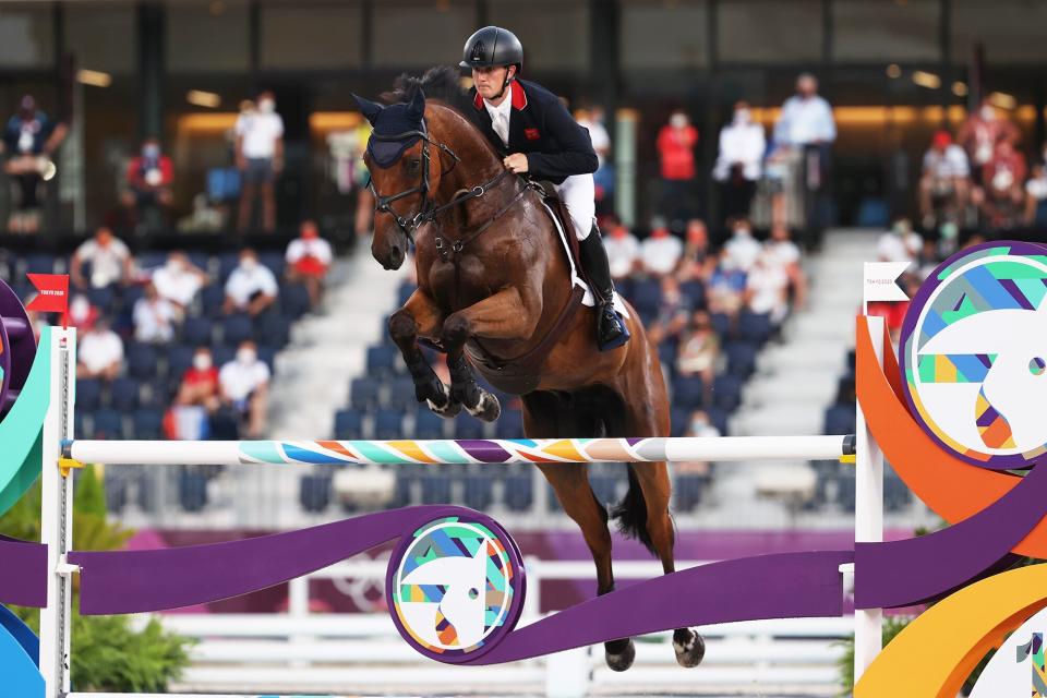 TOKYO, JAPAN - AUGUST 02: Tom Mcewen of Team Great Britain riding Toledo de Kerser competes during the Eventing Jumping Team Final and Individual Qualifier on day ten of the Tokyo 2020 Olympic Gamesat Equestrian Park on August 02, 2021 in Tokyo, Japan. (Photo by Julian Finney/Getty Images)