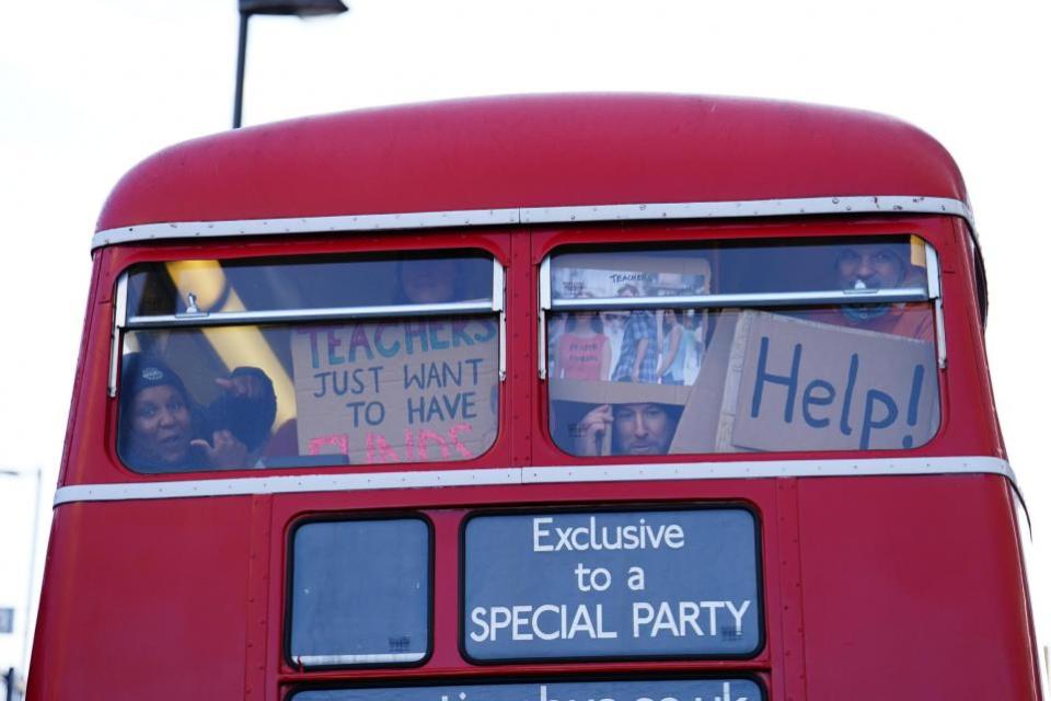 News Shopper: Strikers board Routemaster buses to travel into central London for the Protect The Right To Strike march and rally