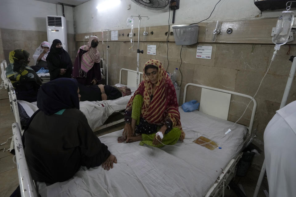 Patients of heatstroke receive treatment at a hospital in Karachi, Pakistan, Thursday, May 23, 2024. Doctors were treating hundreds of victims of heatstroke at various hospitals across Pakistan on Thursday after an intense spell of the heat wave began in the country, and the mercury rose to above normal due to climate change, officials said. (AP Photo/Fareed Khan)