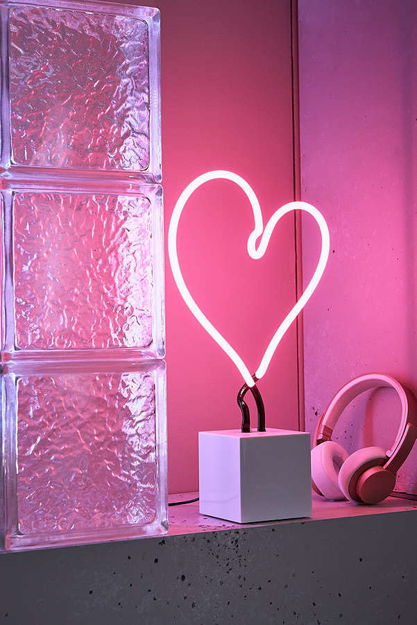 This wedding season, neon signs are stealing the show. According to Chertoff, couples can rent neon table numbers for their reception tables, as well as sayings, such as Drunk in Love, Let&rsquo;s Dance and Happily Ever After. She suggests a bright pink or red heart shape to have as a backdrop, <a href="https://www.urbanoutfitters.com/shop/neon-mfg-heart-neon-sign-table-lamp?adpos=1o5&amp;cm_mmc=SEM-_-Google-_-PLA-_-371314651816_product_type_apartment_product_type_furniture_product_type_lighting&amp;color=040&amp;creative=209973868071&amp;device=c&amp;gclid=CjwKCAiA9rjRBRAeEiwA2SV4ZUOawacfu8mqh2o5gZ7anW-cv-80_X0UhXwDOHZzxfhX7JVUzTCKnRoCylsQAvD_BwE&amp;inventoryCountry=US&amp;matchtype=&amp;mrkgadid=3247931992&amp;mrkgcl=671&amp;network=g&amp;product_id=38296489&amp;rkg_id=h-3fefc698f67eb1d5fa9587121bab3bf5_t-1513019328&amp;utm_campaign=Google&amp;utm_content=371314651816_product_type_apartment_product_type_furniture_product_type_lighting&amp;utm_medium=paid_search&amp;utm_source=SEM&amp;utm_term=GSC%202.0%20-%20Apartment%26Music" target="_blank">like this one from Urban Outfitters</a>.