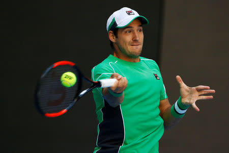 Tennis - China Open - Men's Singles - Second Round - National Tennis Center, Beijing, China - October 3, 2018. Dusan Lajovic of Serbia in action against Grigor Dimitrov of Bulgaria. REUTERS/Thomas Peter