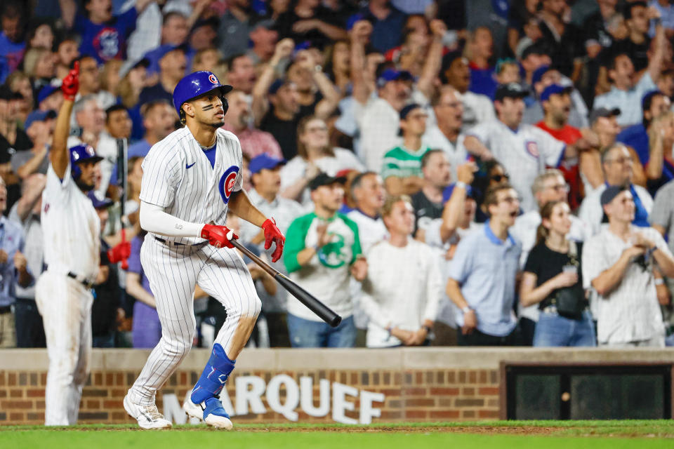 Aug 16, 2023; Chicago, Illinois, USA; Chicago Cubs second baseman Christopher Morel (5) watches his three-run walk-off home run against the Chicago White Sox during the ninth inning at Wrigley Field. Mandatory Credit: Kamil Krzaczynski-USA TODAY Sports