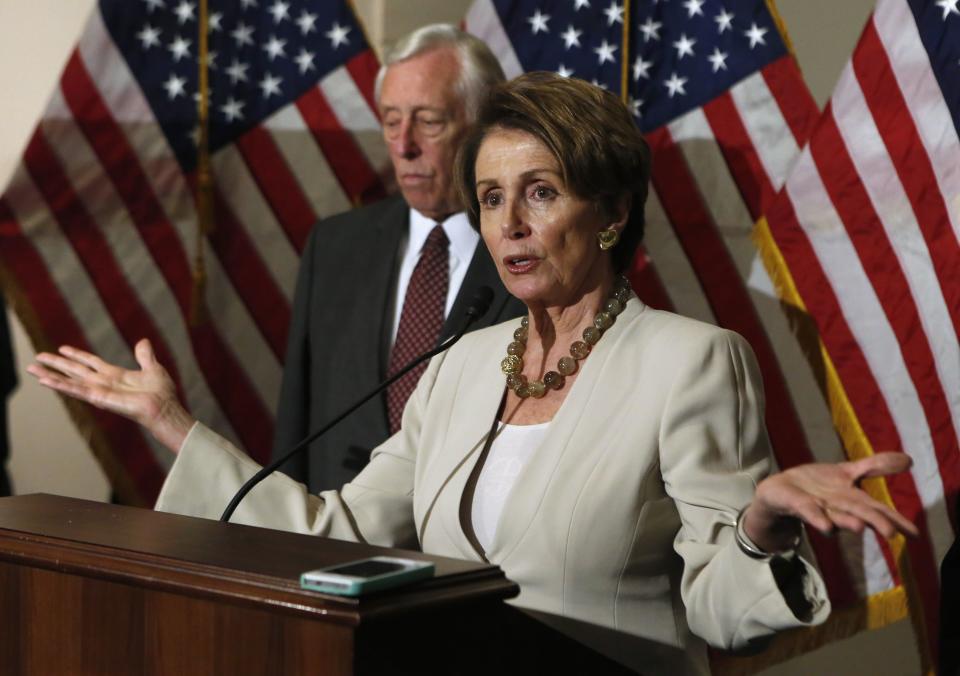 U.S. House Minority Leader Nancy Pelosi (D-CA) talks to the media on Obamacare following a Caucus meeting on Capitol Hill in Washingtojn