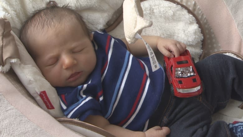 Self-serve: Dad delivers son in gas station parking lot in St. John's