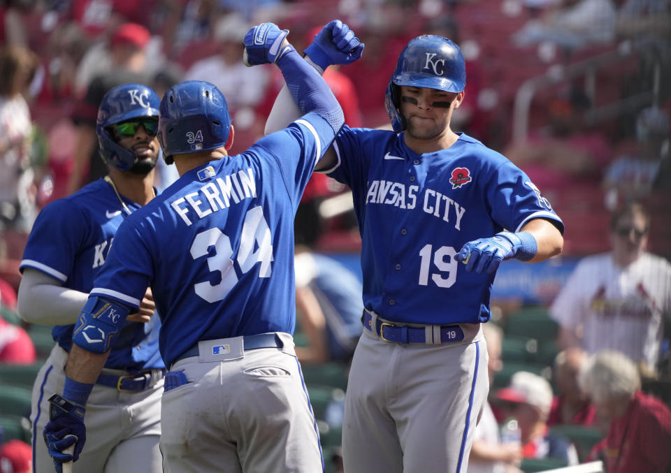 Kansas City Royals' Michael Massey (19) is congratulated by teammate Freddy Fermin (34) after hitting a two-run home run during the ninth inning of a baseball game against the St. Louis Cardinals Monday, May 29, 2023, in St. Louis. (AP Photo/Jeff Roberson)