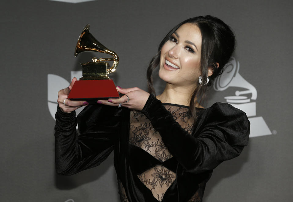 Nella poses in the press room with the award for best new artist at the 20th Latin Grammy Awards on Thursday, Nov. 14, 2019, at the MGM Grand Garden Arena in Las Vegas. (Photo by Eric Jamison/Invision/AP)