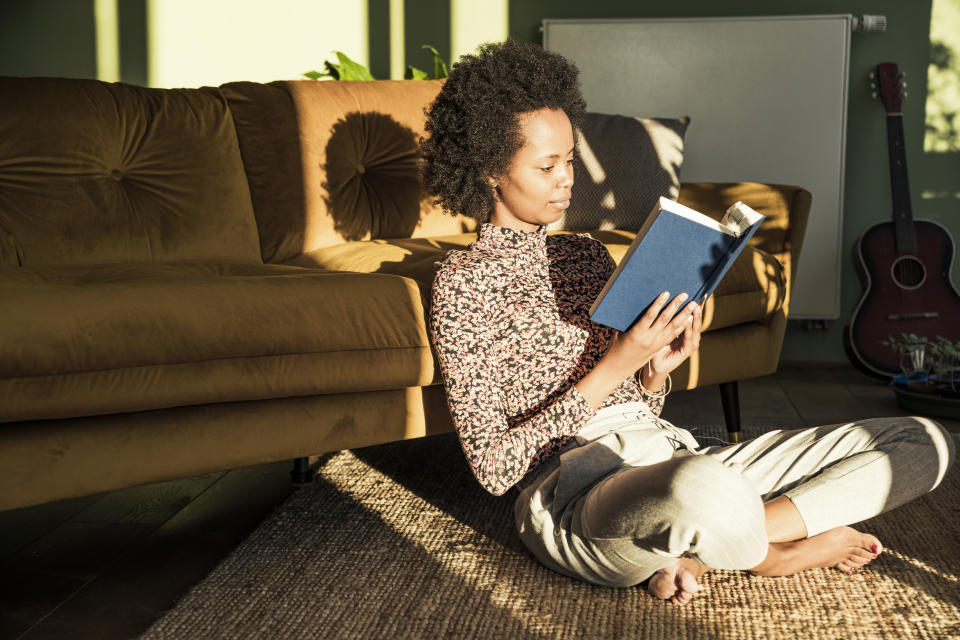 a woman reading by herself