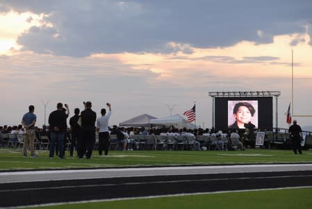 People pay their respects two days after a mass shooting in El Paso