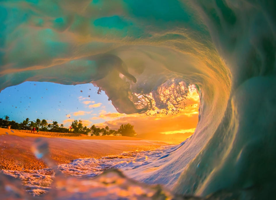 Smooth waves bursting with color give inside view of surfer’s paradise