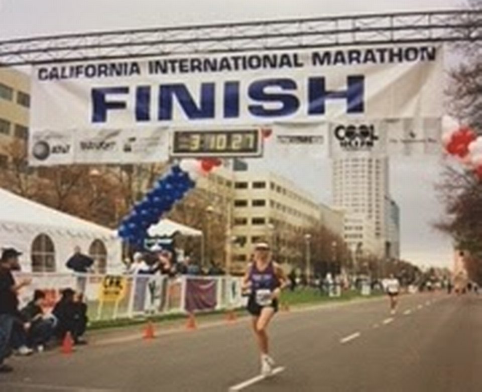 Karen Johnson approaches the finish line of the California International Marathon. Johnson, a Placer County sheriff’s deputy and elite runner, died in January 2003 when she was struck by a vehicle while running in Orangevale. She will be remembered during a Mary 12, 2018, Fun Run in Auburn sponsored by the Placer County Sheriff’s Office to raise funds for Northern California Special Olympics athletes.