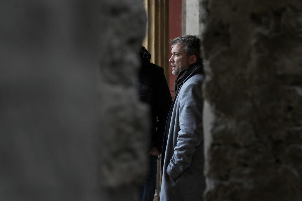 Gabriel Zuchtriegel, director of Pompeii Archaeological Park, walks in the 'peristylium', or courtyard, in the center of the Ancient Roman Domus Vettiorum, House of Vettii, in the Pompeii Archeological Park, near Naples, southern Italy, Wednesday, Dec. 14, 2022. One of Pompeii's most famous and richest domus, which contains exceptional works of art and tells the story of the social ascent of two former slaves, is opening its doors to visitors Wednesday, Jan. 11, 2023 after 20 years of restoration. (AP Photo/Andrew Medichini)