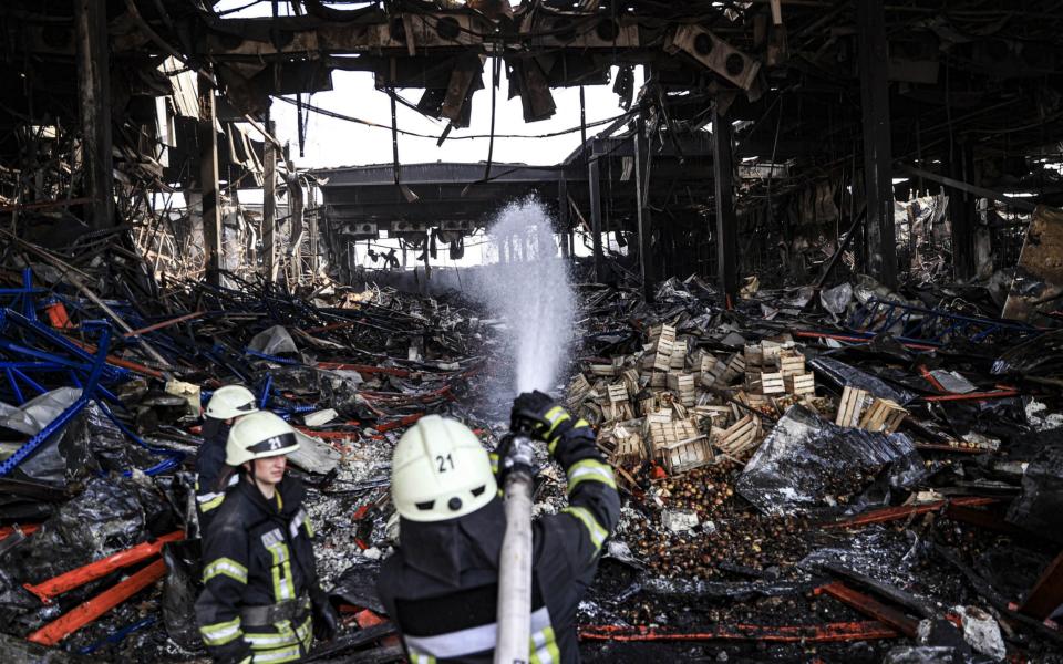 Firefighters today continued to tackle blazes in a logistics warehouse in Kyiv which contained 50,000 tons of food when it was bombed on March 13 in the Brovary region