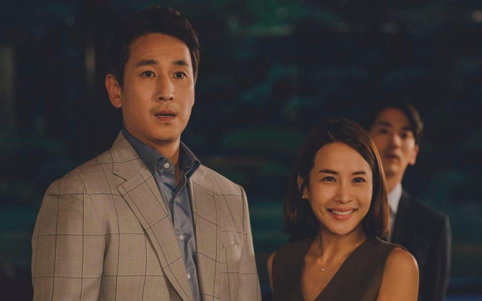 Lee Sun-kyun, left, with Cho Yeo-jeong in Parasite (2019)