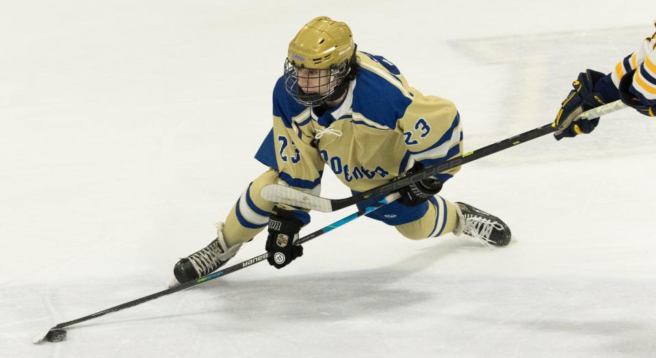 Webster Schroeder's Tyler Lombardo controls the puck.