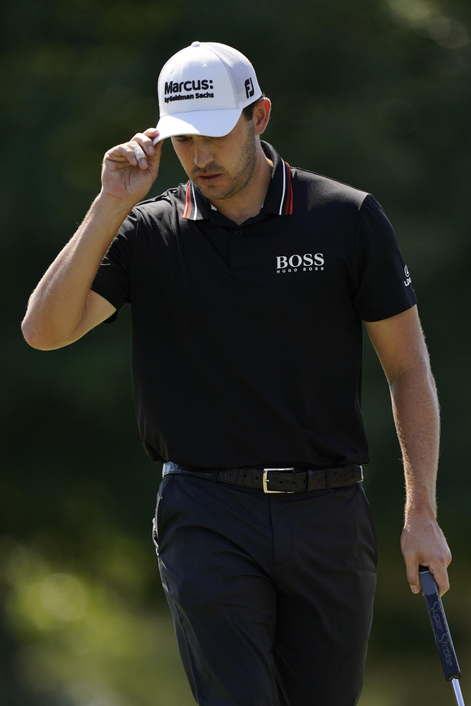 Patrick Cantlay nods to the cheering crowd after putting on the first green during the third round of the Tour Championship golf tournament Saturday, Sept. 4, 2021, at East Lake Golf Club in Atlanta. (AP Photo/Brynn Anderson)