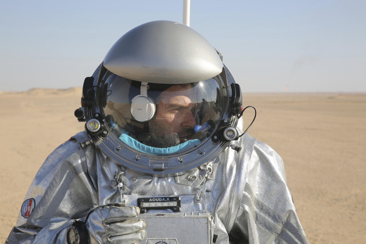 This Feb. 7, 2018, photo shows João Lousada, a flight controller for the International Space Station, wearing an experimental space suit during a simulation of a future Mars mission (AP Photo/Sam McNeil)