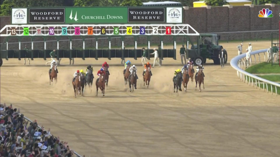 In this image taken from video provided by NBC Sports, the field breaks from the gate in a computer-simulated version of the Kentucky Derby horse race between the 13 winners of the Triple Crown, Saturday, May 2, 2020, in Louisville, Ky. Secretariat, third from right, won the race, which was part of NBC's substitute programming after the Kentucky Derby was postponed by the coronavirus pandemic. (NBC Sports via AP)