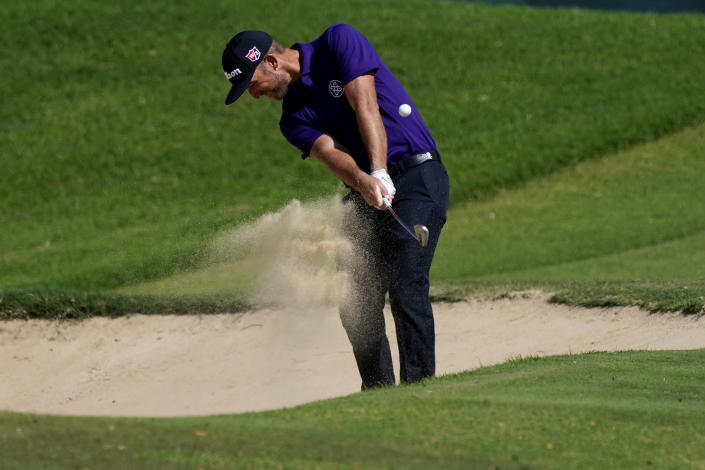 Kevin Chappell hits hits out of the 16th fairway bunker during the first round of the Sony Open golf tournament, Thursday, Jan. 13, 2022, at Waialae Country Club in Honolulu. (AP Photo/Matt York)