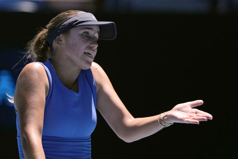 Sofia Kenin of the U.S. reacts during her first round match against Iga Swiatek of Poland at the Australian Open tennis championships at Melbourne Park, Melbourne, Australia, Tuesday, Jan. 16, 2024. (AP Photo/Andy Wong)