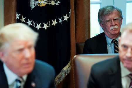 White House National Security Advisor John Bolton looks on as U.S. President Donald Trump holds a cabinet meeting at the White House in Washington, U.S. May 9, 2018. REUTERS/Jonathan Ernst