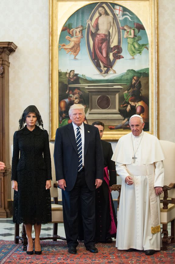 Mandatory Credit: Photo by Vatican Pool/AGF/REX/Shutterstock (8839851x) First Lady Melania Trump with US President Donald Trump and Pope Francis during the private audience Donald Trump visit to the Vatican, Rome, Italy - 24 May 2017