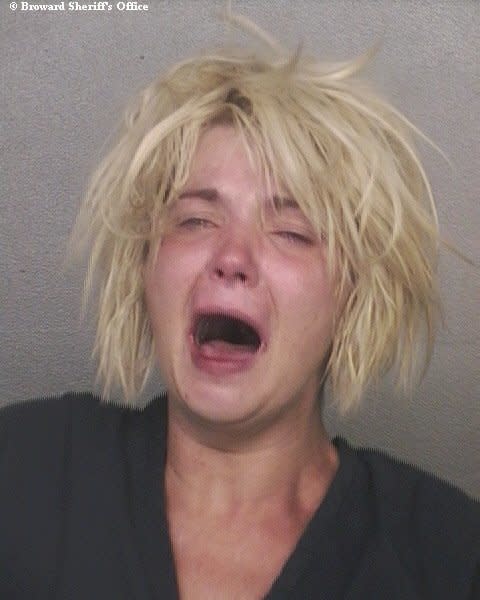 Mabb couldn't control her emotions in this mugshot, taken after she was arrested for <a href="http://www.huffingtonpost.com/2012/06/07/tracy-mabb-exposed-intersection-florida_n_1578445.html" target="_blank">allegedly exposing her genital areas to motorists driving past a Pompano Beach, Fla. intersection. </a>